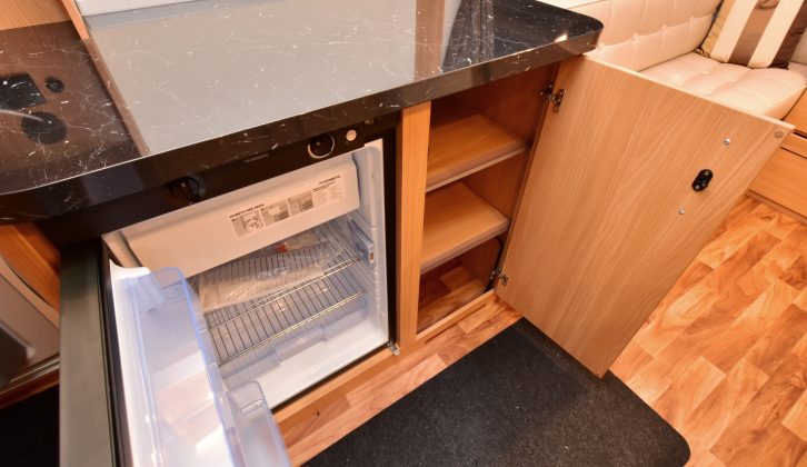 You get a Dometic fridge/freezer and more storage in the nearside dresser