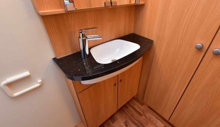 Floor space in the StarClass 480's end washroom is good and storage continues to impress
