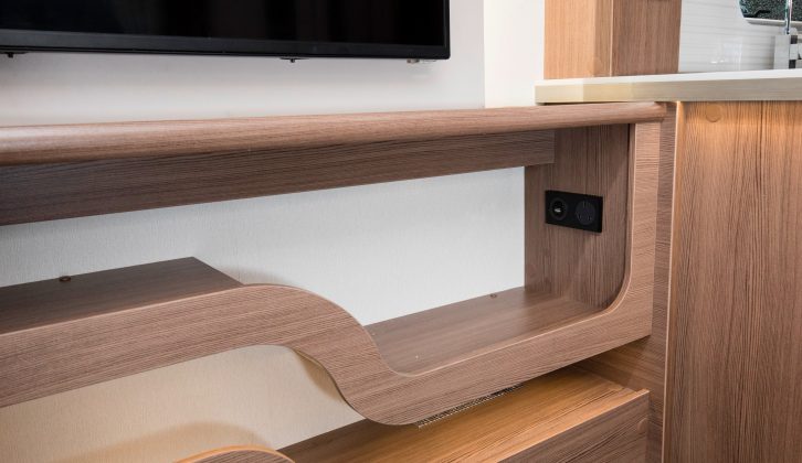 With USB and 230V points here, this stylish shelf beneath the TV is a handy resting place for charging devices, or for a DVD player or games console