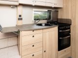 The kitchen in the Elddis Avanté 860 has a separate oven and grill, a dual-fuel hob and a microwave – and lots of storage
