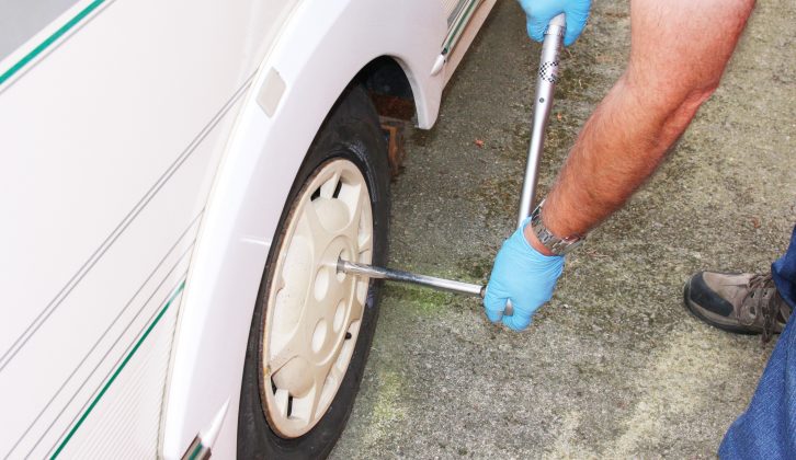 At the end of the regritting process, replace the caravan's wheels and torque the wheel bolts