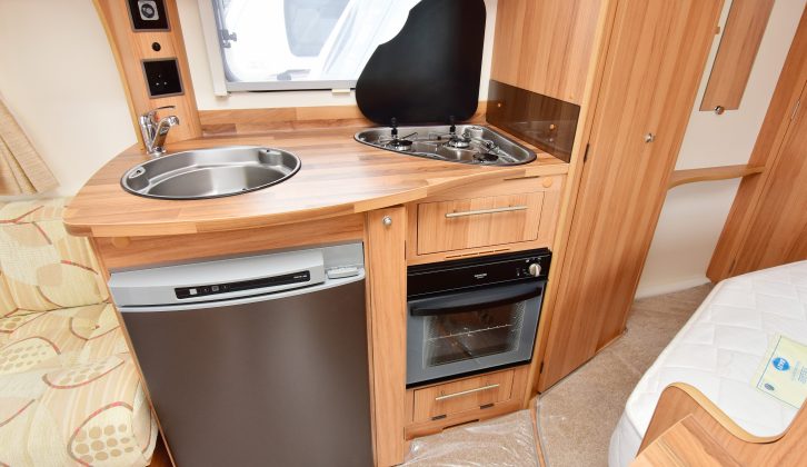 There's a combined oven and grill, a 107-litre Thetford fridge and a good-sized, stainless steel sink in this tourer's kitchen