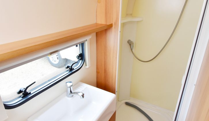 There's a well-proportioned hand basin under the window in this Bailey Orion 430/4's full-width end washroom