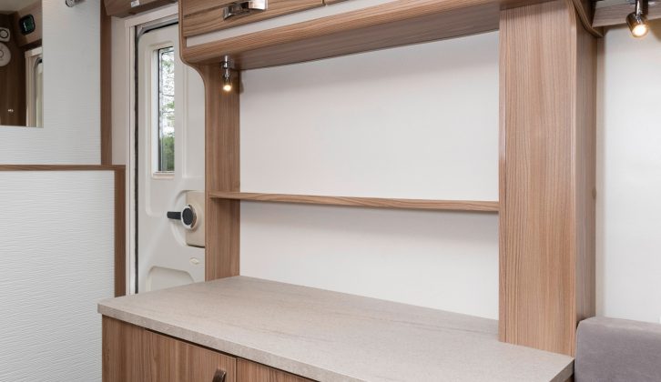 On the nearside, opposite the kitchen, is this large sideboard with storage, handy for food preparation