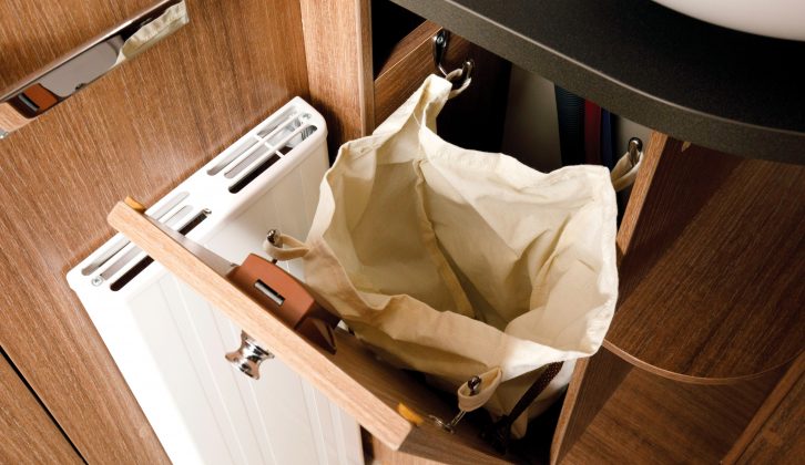 While this pull-out laundry basket is a neat and thoughtful touch, this one might be a little small