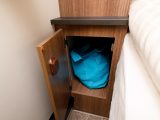 ...with small cupboards beneath, a shelf for books, glasses, a cuppa or phones in between