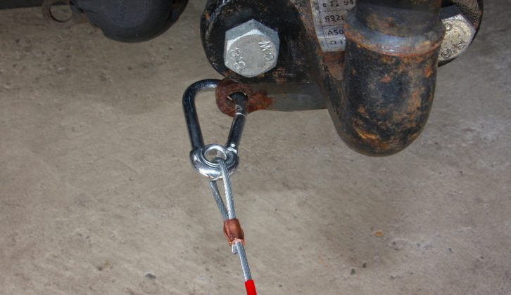 This shows a carabiner-type breakaway cable properly attached