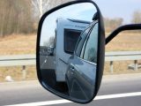 If you are towing a caravan you must be able to see 20 metres behind you and four metres either side of the towed outfit to comply with the law, hence towing mirrors are required