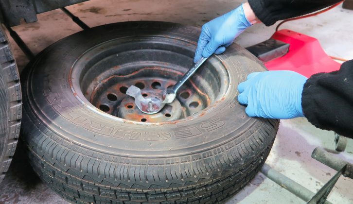 Tyre walls are assessed for cracks and the spare wheel is checked