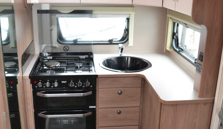 The L-shaped kitchen means you have a generous amount of food-preparation space and storage provision is good, too