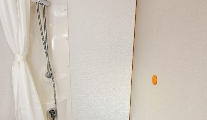 The shower curtain will help prevent you from soaking the entire washroom