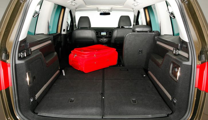 All five rear seats fold flat into the floor, creating a cavernous 2297-litre boot