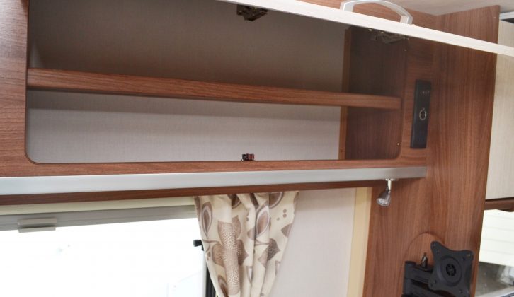 Shelved overhead lockers on three sides of the lounge will help you make use of the caravan's 212kg payload