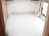 The nearside French bed is 1.91 x 1.34m (6'3" x 4'5"), plus each occupant gets a reading light and a shelf