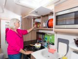 The well-equipped kitchen has a Thetford three-burner hob, an oven and a grill