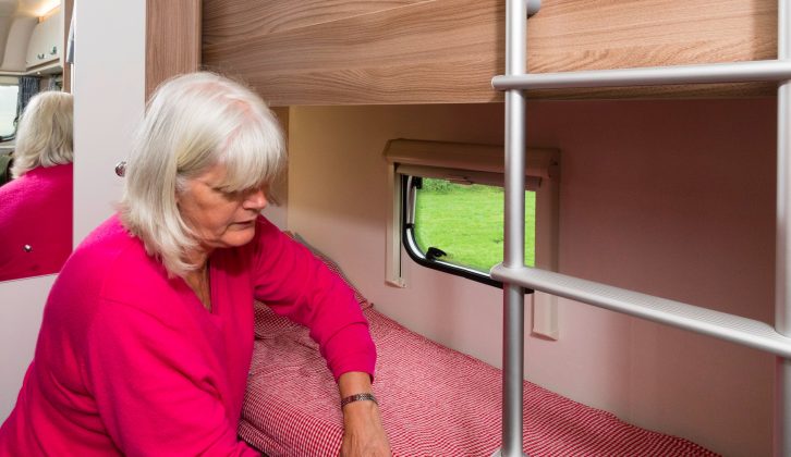 Each of the 1.83 x 0.57m nearside fixed bunks has its own light, cubbyhole and window
