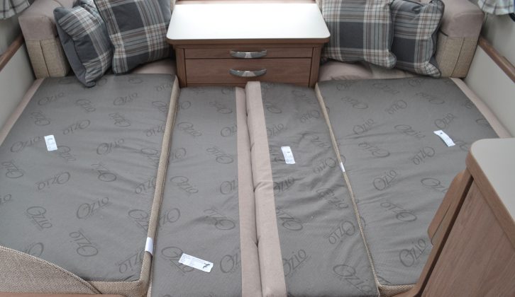 The front make-up double bed measures (1.13m x 1.99m/3'8" x 6'6")