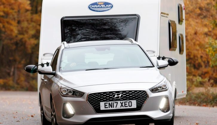 The Hyundai i30 Tourer changed lane crisply and gripped securely, with no pushing or shoving from the caravan