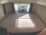 Rear fixed bed in the Eriba Touring Troll 530 '60 Edition' has a cold foam mattress split in the middle for easy access to the underbed storage