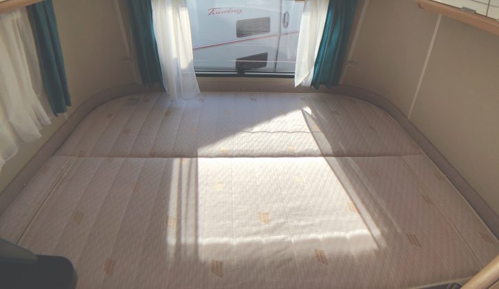 Rear fixed bed in the Eriba Touring Troll 530 '60 Edition' has a cold foam mattress split in the middle for easy access to the underbed storage