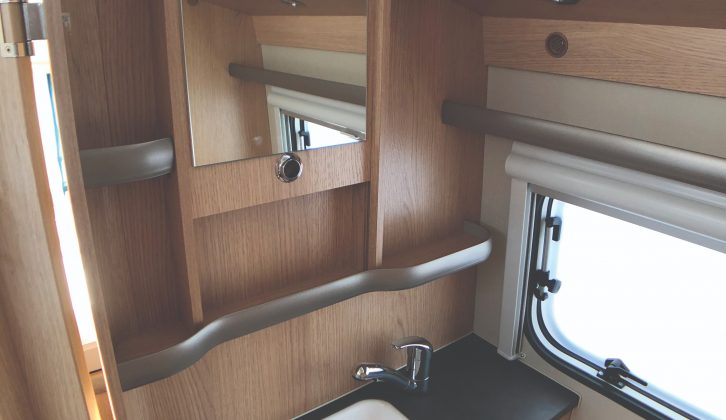 Vanity unit in the Eriba Touring Troll 530 '60 Edition' has a mirror that's attached to the roof liner so it rises and falls with the pop-top
