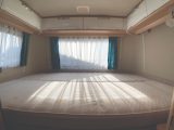 Comfortable cold foam mattress in the rear bedroom of the Eriba Touring Troll 530 '60 Edition'. It's low-set for easy ingress and egress