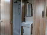 Offside central washroom in the Swift Freestyle SE S6 TD showcases Swift Group's pleasing design DNA, and has a separate shower compartment for maximum convenience