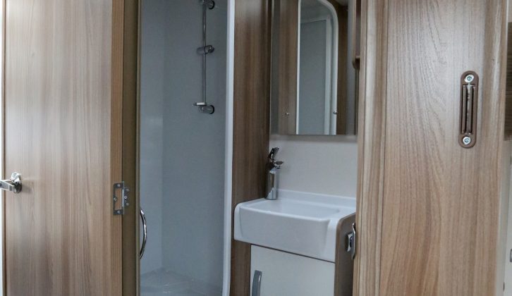 Offside central washroom in the Swift Freestyle SE S6 TD showcases Swift Group's pleasing design DNA, and has a separate shower compartment for maximum convenience
