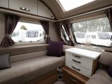 The front lounge in the Swift Freestyle SE S6 TD carries the same cabinetwork as the Sprite Major 6 TD, although the soft furnishings and pleated cassette blinds are dealer special upgrades