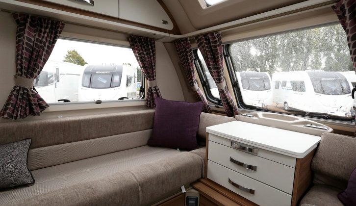 The front lounge in the Swift Freestyle SE S6 TD carries the same cabinetwork as the Sprite Major 6 TD, although the soft furnishings and pleated cassette blinds are dealer special upgrades