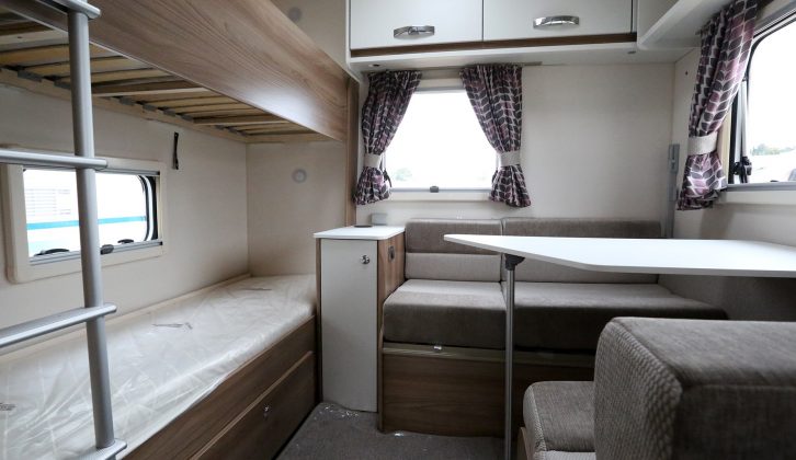 Discrete zone for children at the rear of the Swift Freestyle SE S6 TD features two 6ft-long fixed bunks with two further berths available by converting the side dinette. This space can be partitioned off