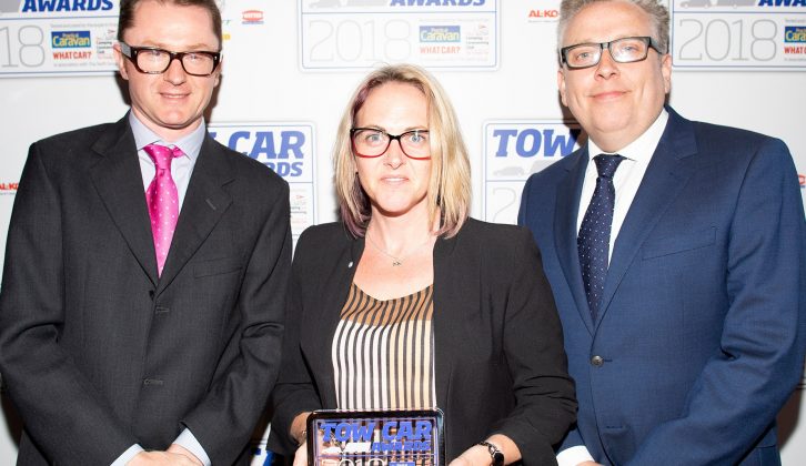 Volkswagen's Nikki Divey collects the award for the Best Ultralight Tow Car - the Volkswagen Polo -
 in the Tow Car Awards 2018, from Practical Caravan's editor, Niall Hampton, and co-host James Cannon