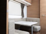 The side dinette becomes another berth simply by dropping the table and rearranging the cushions