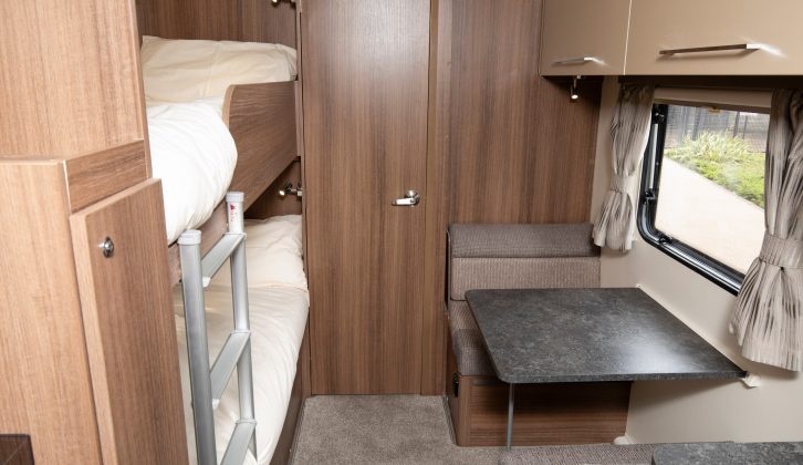 The new Bailey Phoenix 650 caravan has a pair of fixed bunks opposite its rear dinette. Both lead on to an end washroom