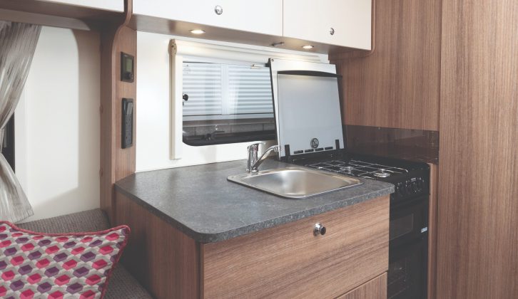 The Bailey Phoenix 640's kitchen has granite-effect worktops and good storage