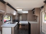 The Coachman Vision 575's floorplan features a transverse island bed that leads on to a well-appointed end washroom