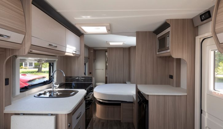 The Coachman Vision 575's floorplan features a transverse island bed that leads on to a well-appointed end washroom