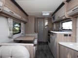 Mealtimes in the 2019 Coachman Pastiche 470 are catered for by an offside midships dinette