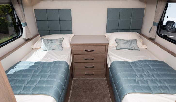 At the rear of the Compass Camino 674, you'll find the on-trend fixed twin single beds. There's plenty of storage here, including a smart centre chest