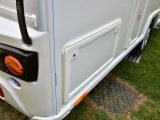 External locker door on the offside of the Bailey Phoenix 420 enables extra storage as well as access to the cassette loo