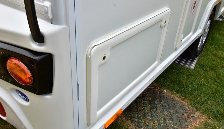 External locker door on the offside of the Bailey Phoenix 420 enables extra storage as well as access to the cassette loo
