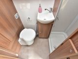 Washroom in the Bailey Phoenix 420 has less floor area due to the wardrobe base being used for exterior storage and loo cassette hatch