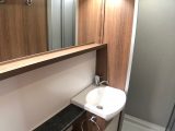 The new Bailey Pegasus Grande Brindisi has an end washroom for maximum comfort and convenience. Check out the super-wide mirror!