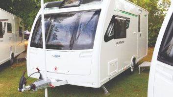 This season, the Quasar's exterior has a distinctive green stripe on the decals, differentiating it from other caravans at this price point