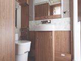 The elegant washroom provides loads of floorspace and a generous dressing area