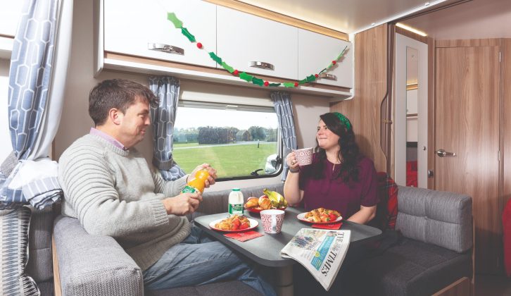 The middle dinette seats up to four in comfort so you don't always have get the table out from its storage spot near the fridge