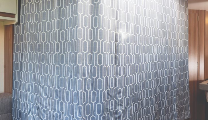 Both the dinette bed and the rear corner bed can be partitioned off for privacy