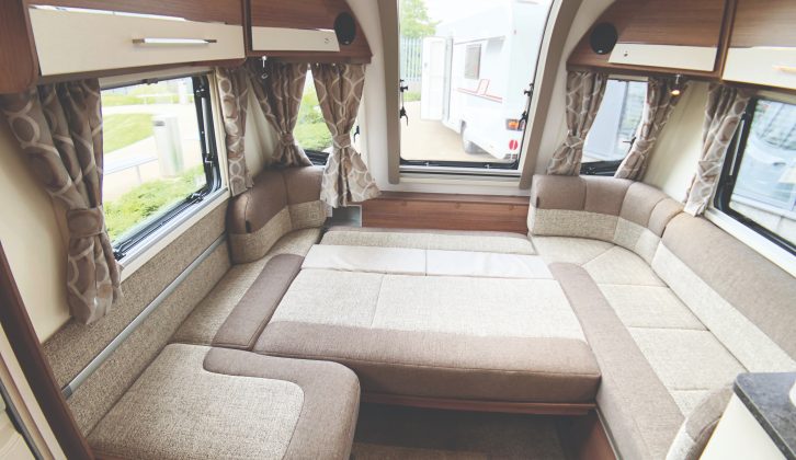 The make-up double bed exploits the caravans 8ft width to measure a comfy 7ft 3in by 3ft 11in