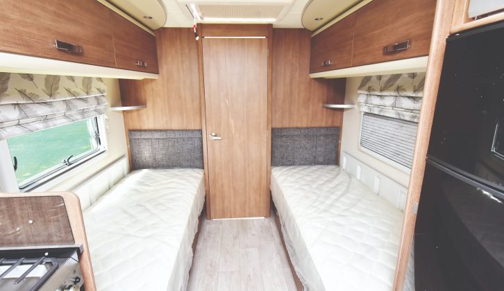 Single beds are placed at a sensible height, with comfortable mattresses and storage underneath