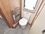 Additional storage capacity in the wardrobe base lessens floor space in the washroom